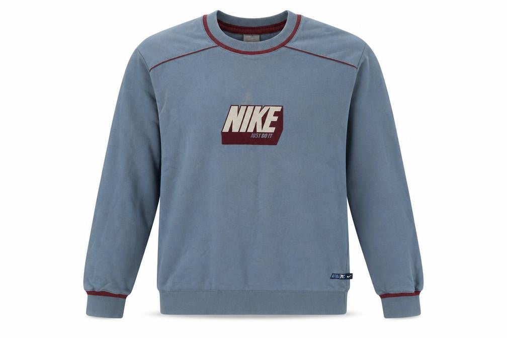 Front view of Nike boys’ blue pullover sweatshirt l with logo