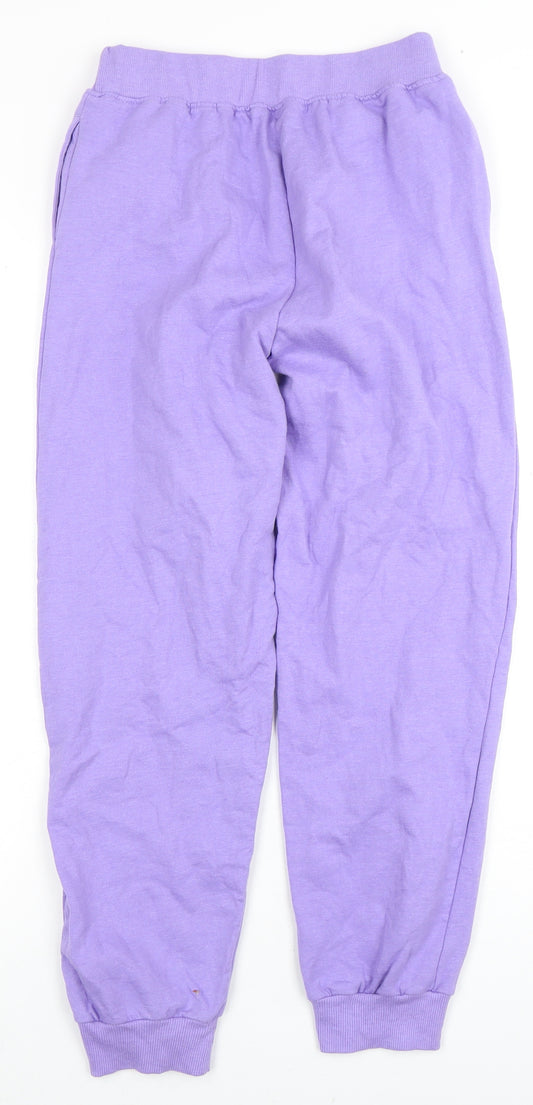 Front view of DKNY girls’ purple jogger trousers xl activewear