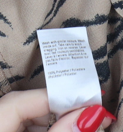 River Island Women's Beige Animal Print Trousers - Size 14