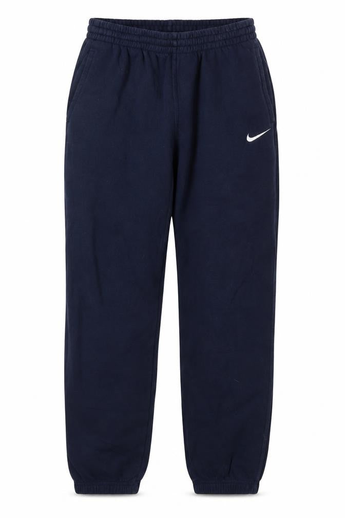 Front view of Nike boys’ blue xl jogger trousers elastic waist