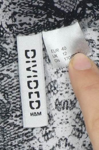 H&M Women’s Black Animal Print Tunic Blouse, Size 12