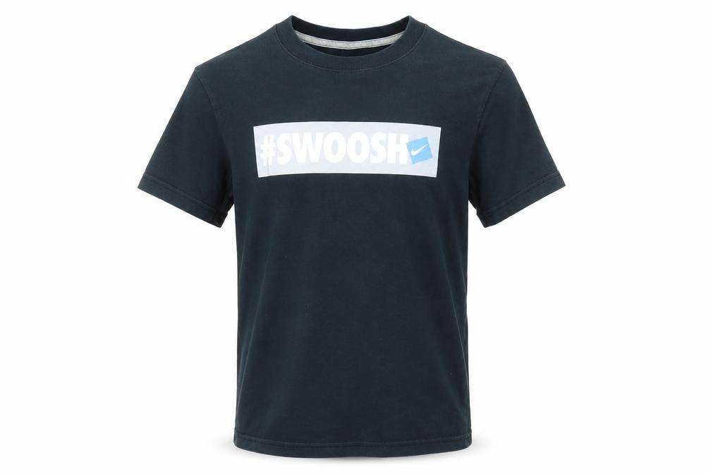 Front view of Nike boys’ black graphic print t-shirt, size S