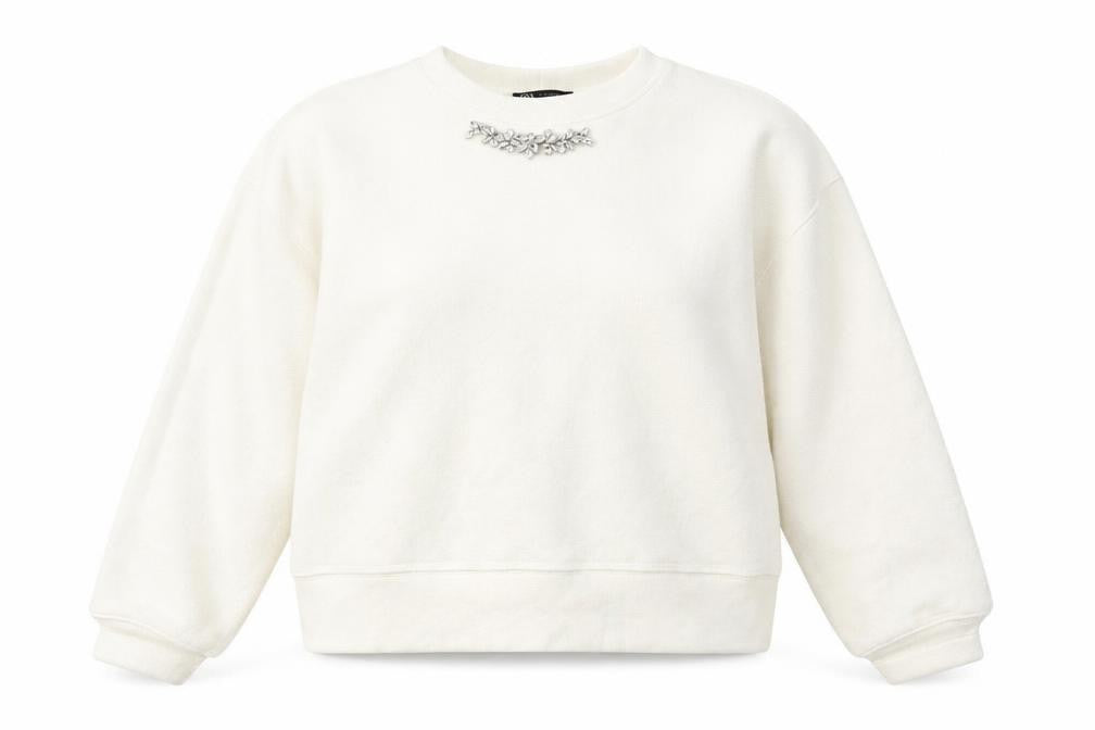 Front view of Zara Women's Ivory Pullover Sweatshirt, size 12