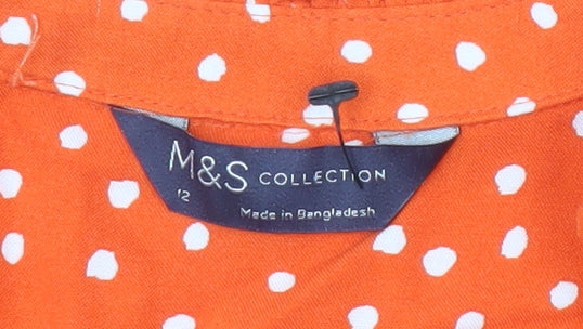 Marks and Spencer Women's Orange Polka Dot Blouse - Size 12