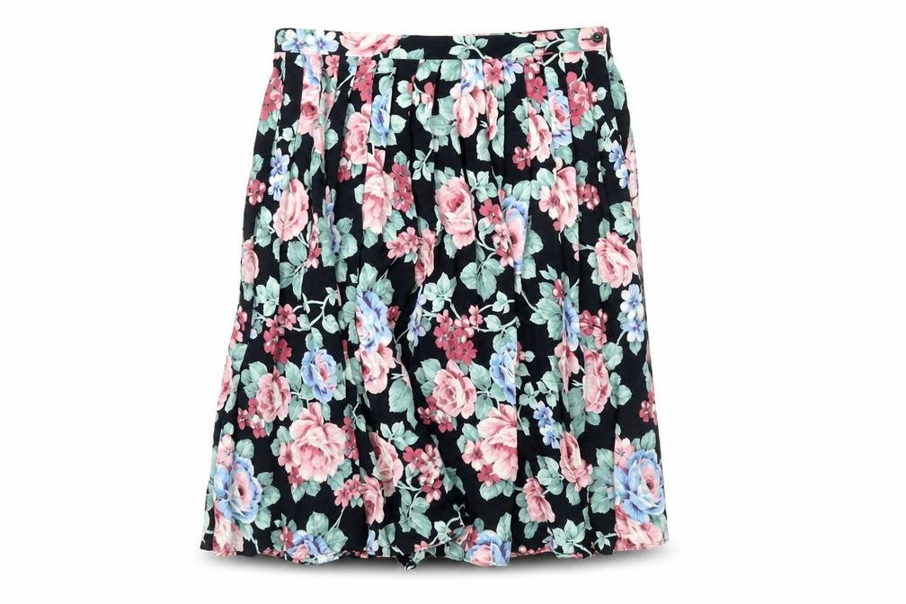 Front view of St Michael Women's Black Floral Pleated Skirt, size 18