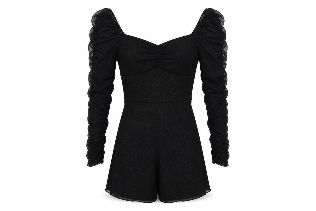 Front view of Quiz Women's Black Long Sleeve Ruffle Playsuit, size 10