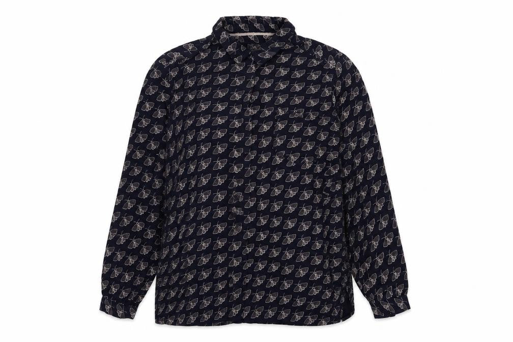 Front view of Marks & Spencer Women's Blue Animal Print Blouse, size 18