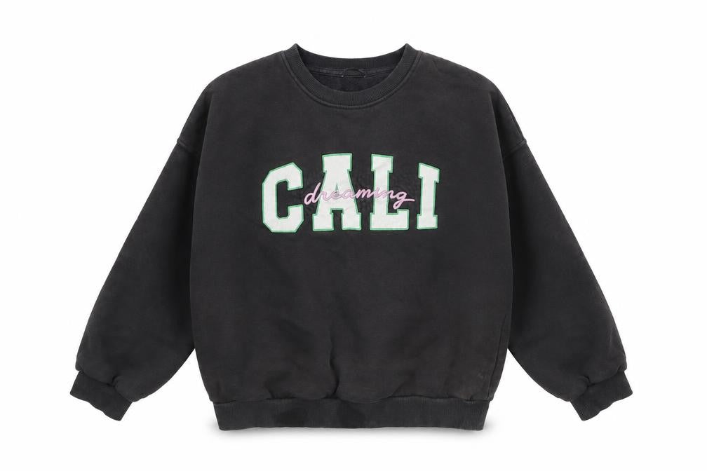 Front view of Marks & Spencer girls’ black pullover sweatshirt 9-10y