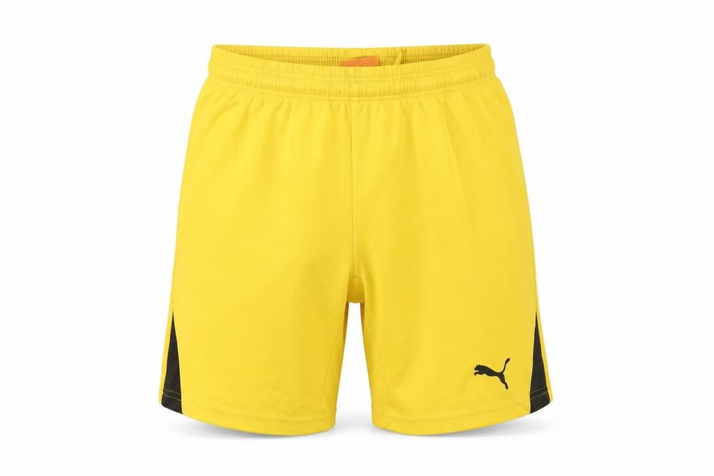 Front view of Puma boys’ yellow activewear shorts, uk, size 12, summer