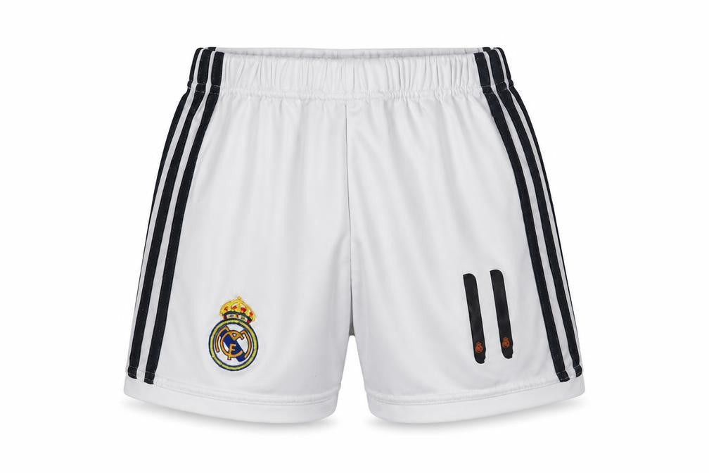 Front view of Adidas boys’ white athletic shorts s football