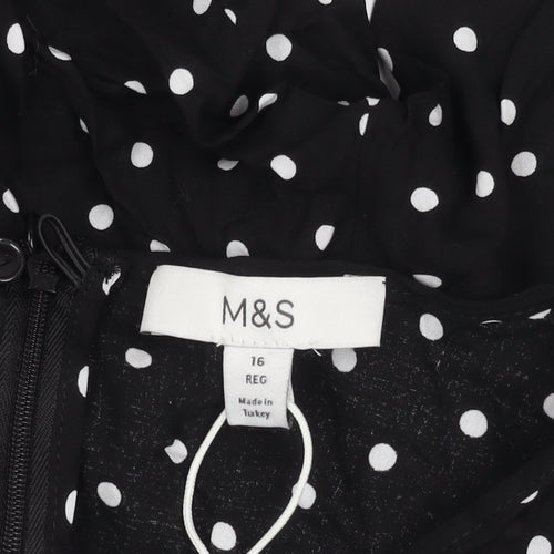 Marks and Spencer Women's Black Polka Dot Dress - Size 16