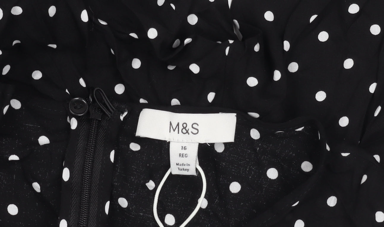 Marks and Spencer Women's Black Polka Dot Dress - Size 16