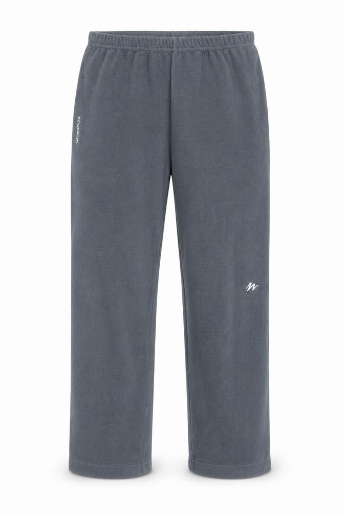 Front view of Quechua boys’ grey fleece trousers - 14 years, regular fit