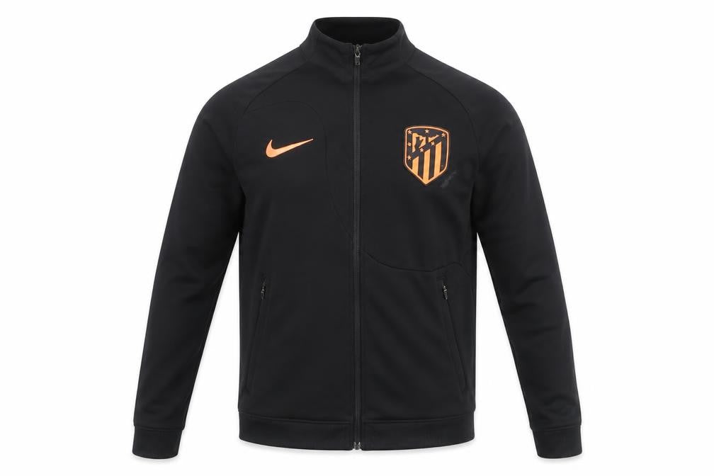 Front view of Nike boys’ black track jacket, size 14 slim, fit sports
