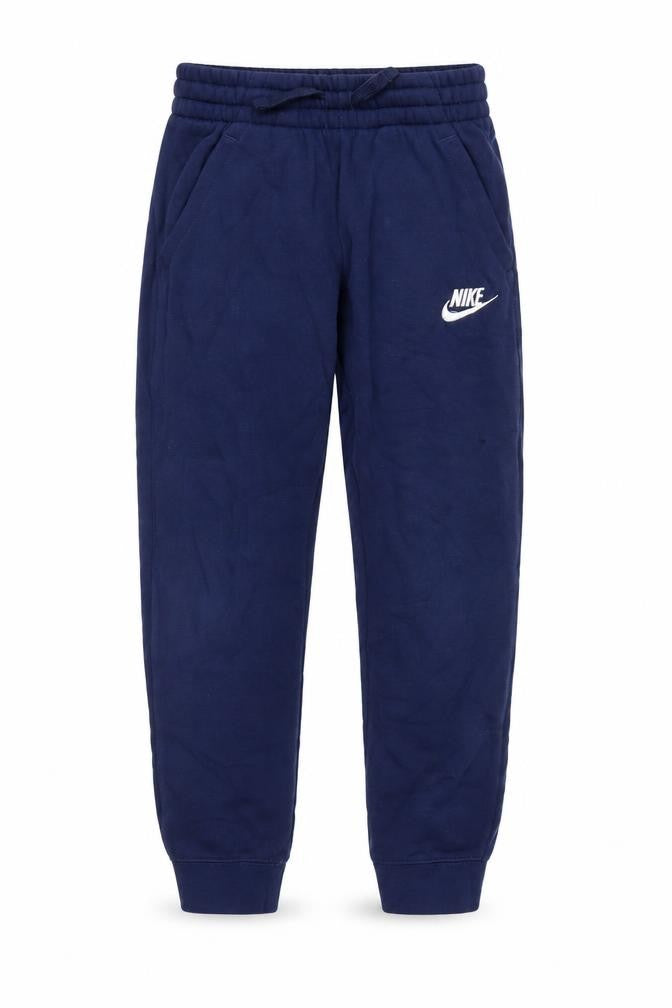 Front view of Nike boys’ blue jogger trousers, size S