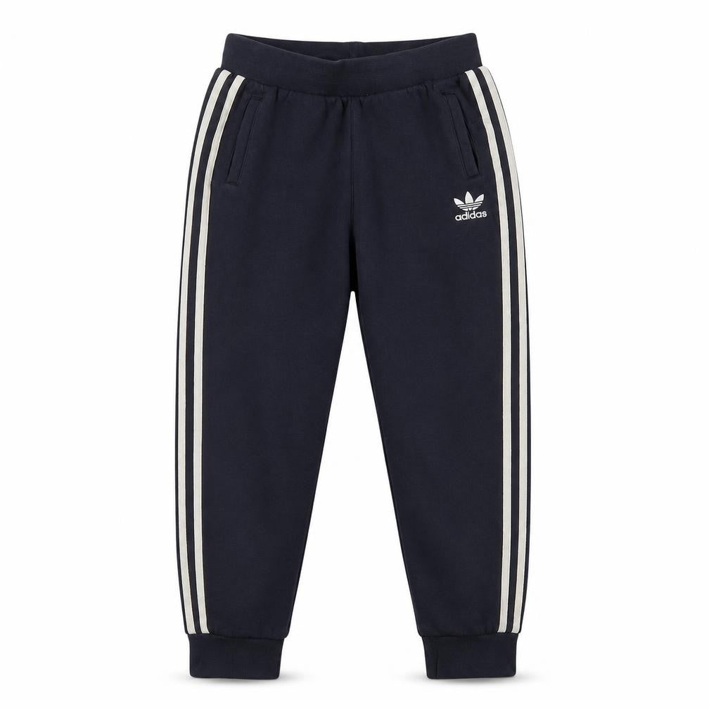 Front view of Adidas boys’ blue jogger trousers 10 years