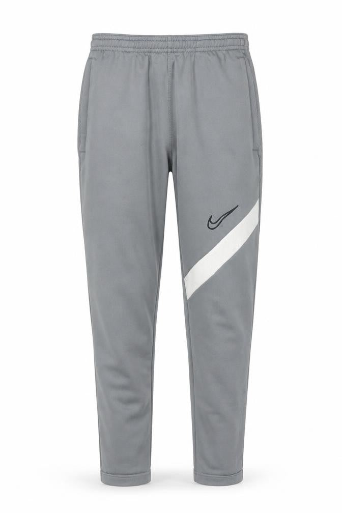 Front view of Nike boys’ grey jogger trousers m elastic waist