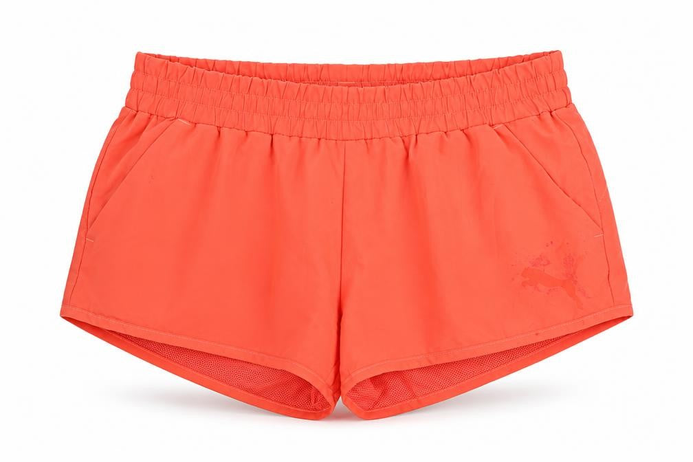 Front view of Puma Women's Orange Athletic Shorts, size 10