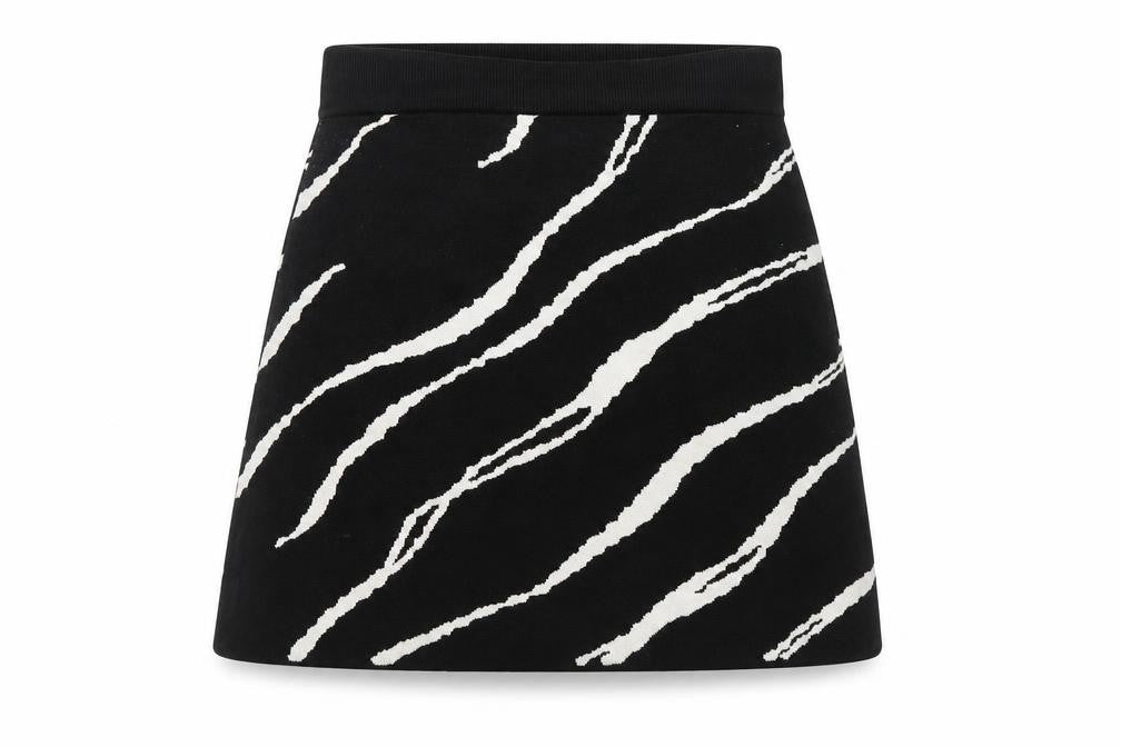 Front view of Weekday Women's Black Animal Print Skirt M