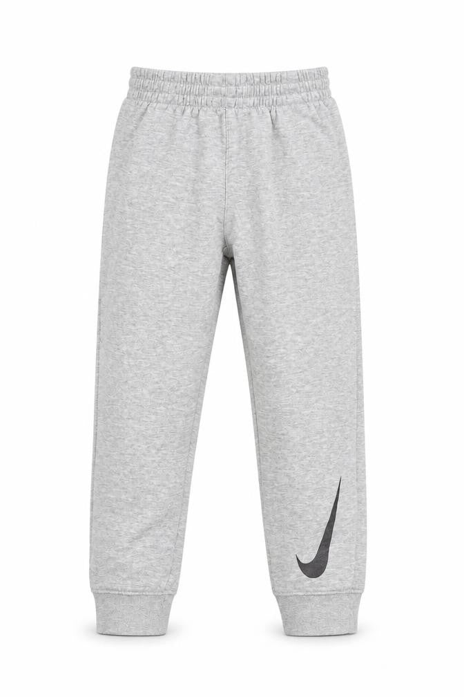 Front view of Nike boys’ grey jogger trousers, size 7, elastic waist