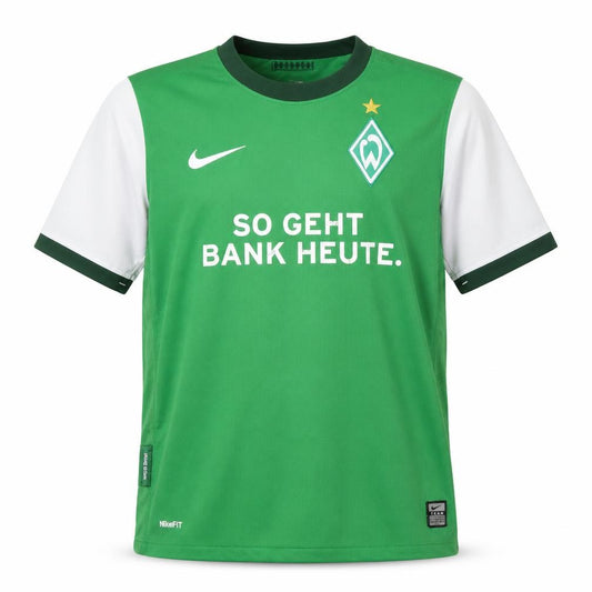 Front view of Nike boys’ green football jersey l short sleeve
