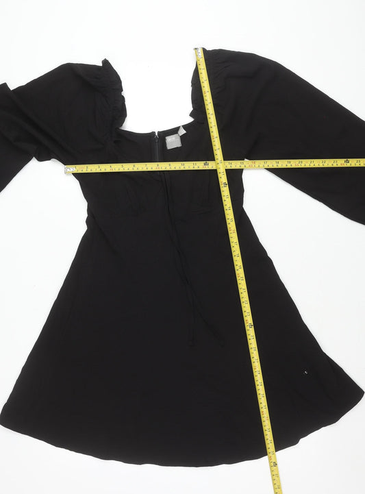 Back view of ASOS Women’s Black, size UK 10, Fit & Flare Puff Sleeve Dress