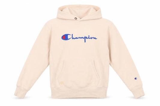 Front view of Champion women’s beige small pullover hoodie embroidered logo