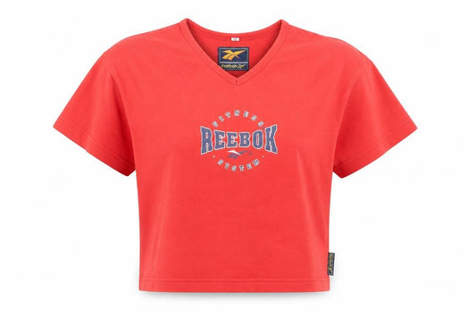 Front view of Reebok women’s red cropped v-neck t-shirt, size UK 12, sports style