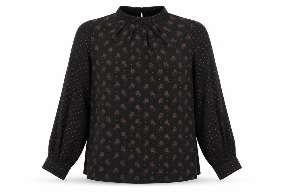 Front view of Warehouse women’s black floral polka dot long sleeve blouse, size UK 10