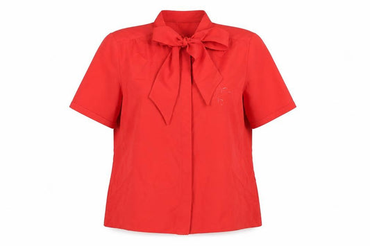 Front view of Canda women’s red short sleeve bow neck blouse, size UK 12, polyester classic