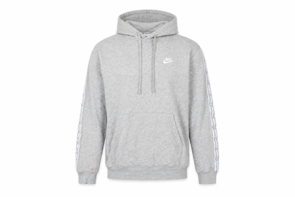 Front view of Nike Men’s Grey Pullover Hoodie Small Logo Tape Sportswear
