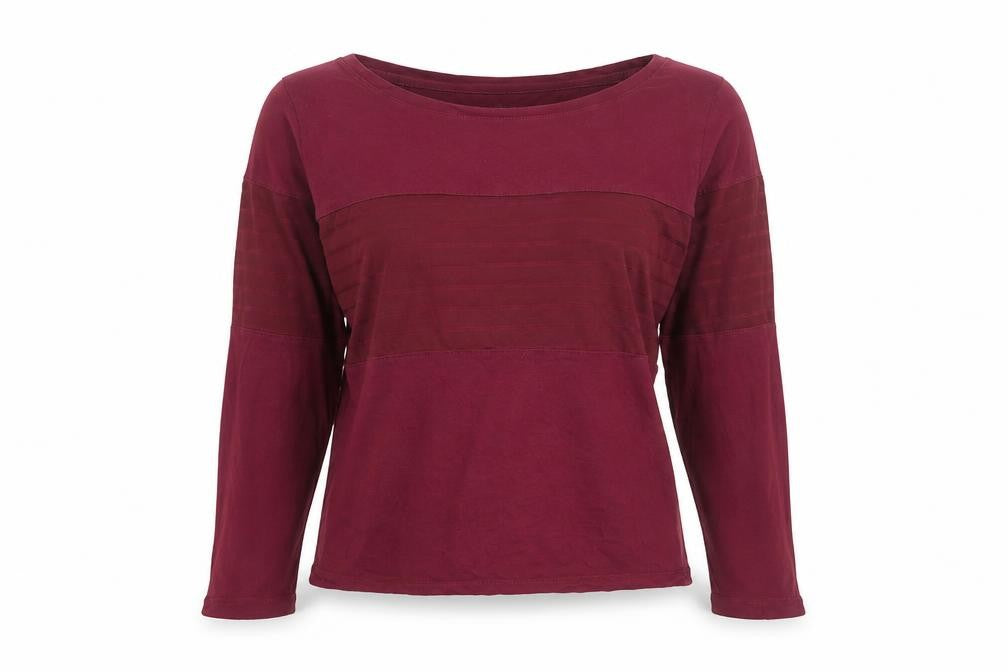 Front view of Reebok women’s red xs long sleeve pullover activewear top