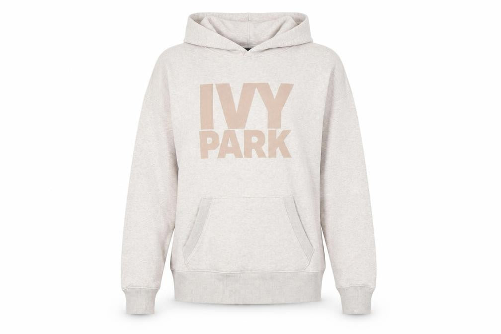Front view of Ivy Park Women’s Beige Pullover Hoodie, size S, Logo Print