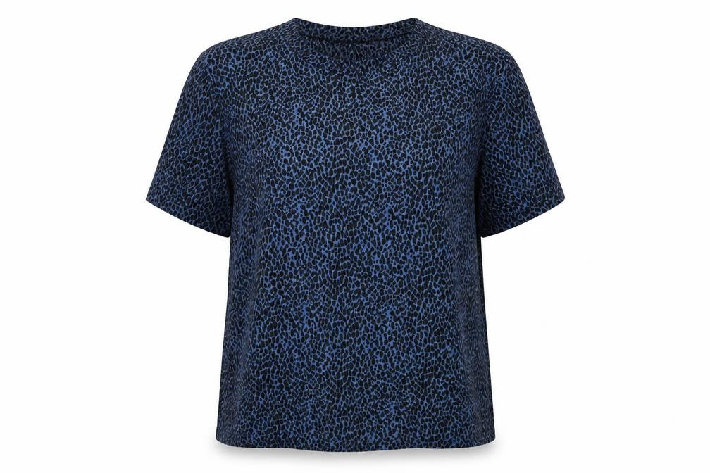 Front view of b.young women’s blue animal print short sleeve blouse m