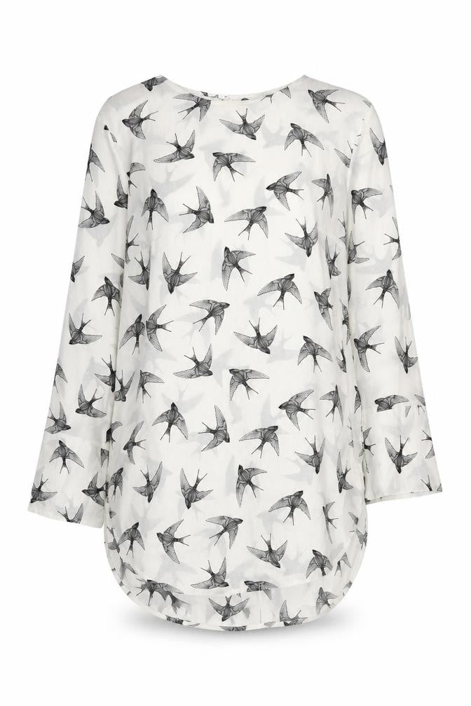 Front view of H&M women’s white bird print shift dress, size UK 10, long sleeve
