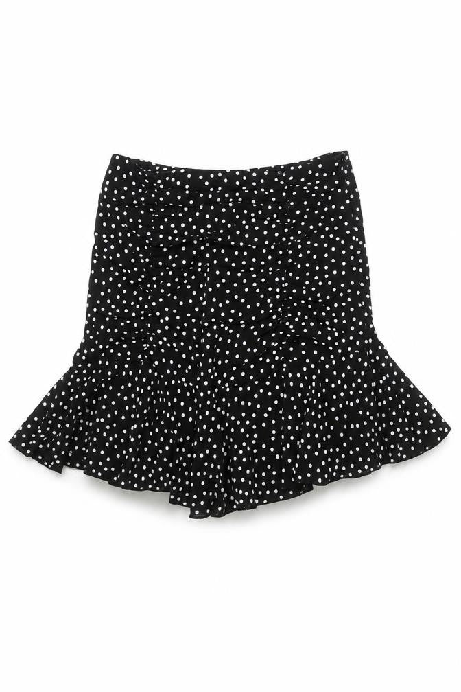 Front view of Quiz women’s black polka dot asymmetric ruffle skirt, size UK 6