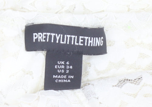 PrettyLittleThing Women’s Ivory Lace Belted Hot Pants UK 6