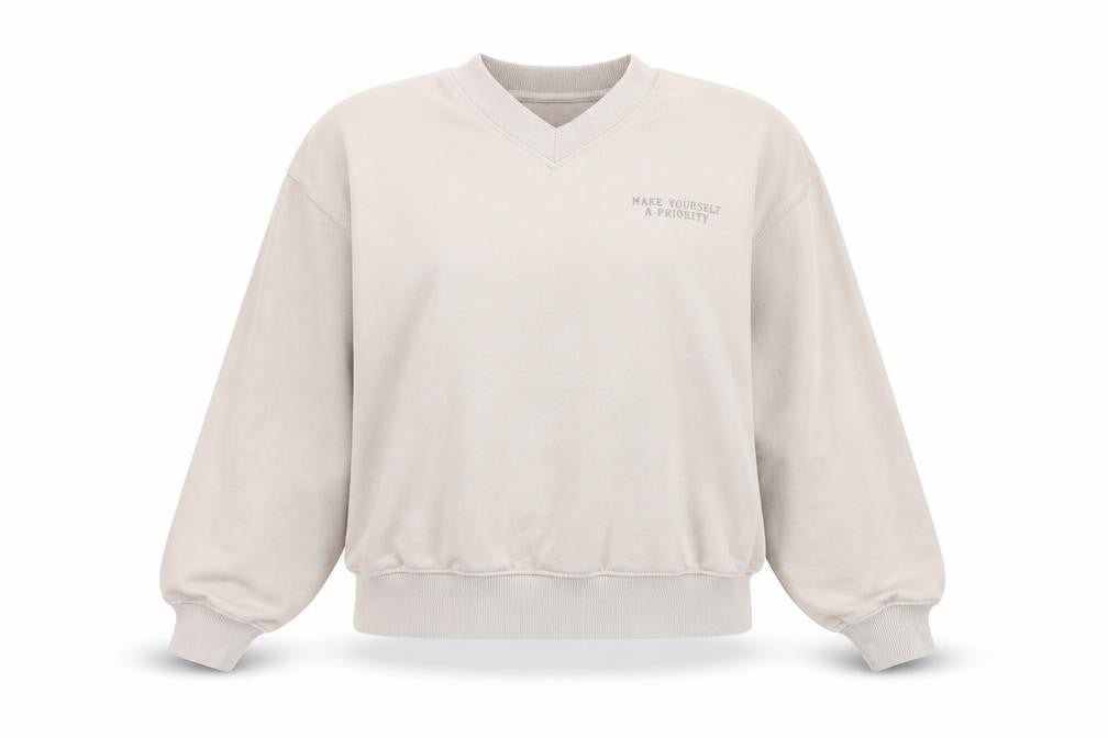 Front view of Dunnes Women Beige V-Neck Pullover Sweatshirt L