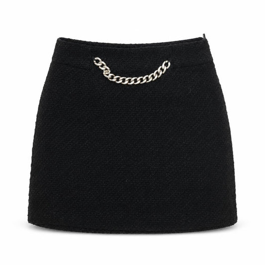 Front view of Mango Women’s Black Tweed Mini Skirt, size UK 12, with Chain Detail
