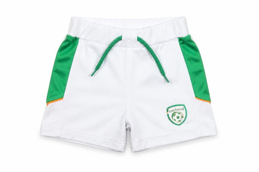Front view of Dunnes unisex baby white green football shorts 12-18 months polyester