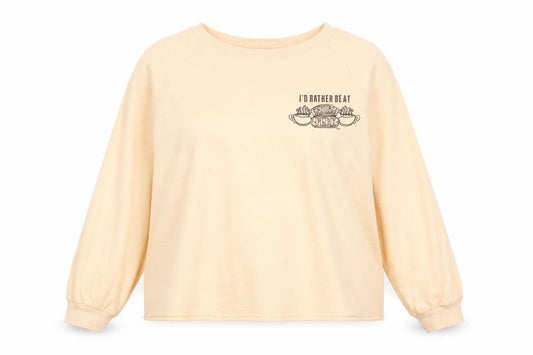 Front view of FRIENDS TV Show Women's Beige Central Perk Pullover Sweatshirt L