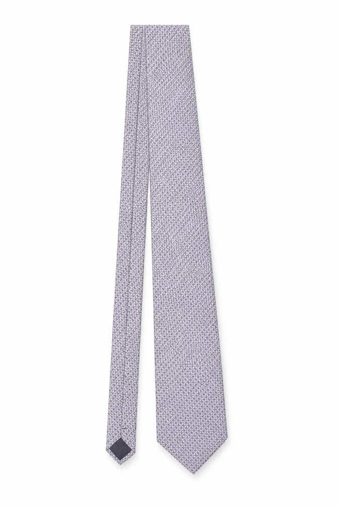 Front view of Eddy Taylor Men's Purple Geometric Slim Silk Tie