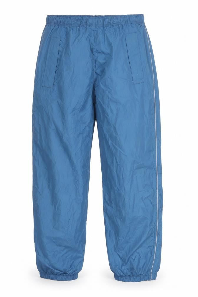 Front view of Crane men’s blue windbreaker trousers l 36in waist elasticated lightweight
