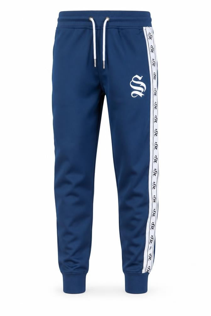 Front view of Sinners Attire boys’ blue xs jogger trousers with side stripe