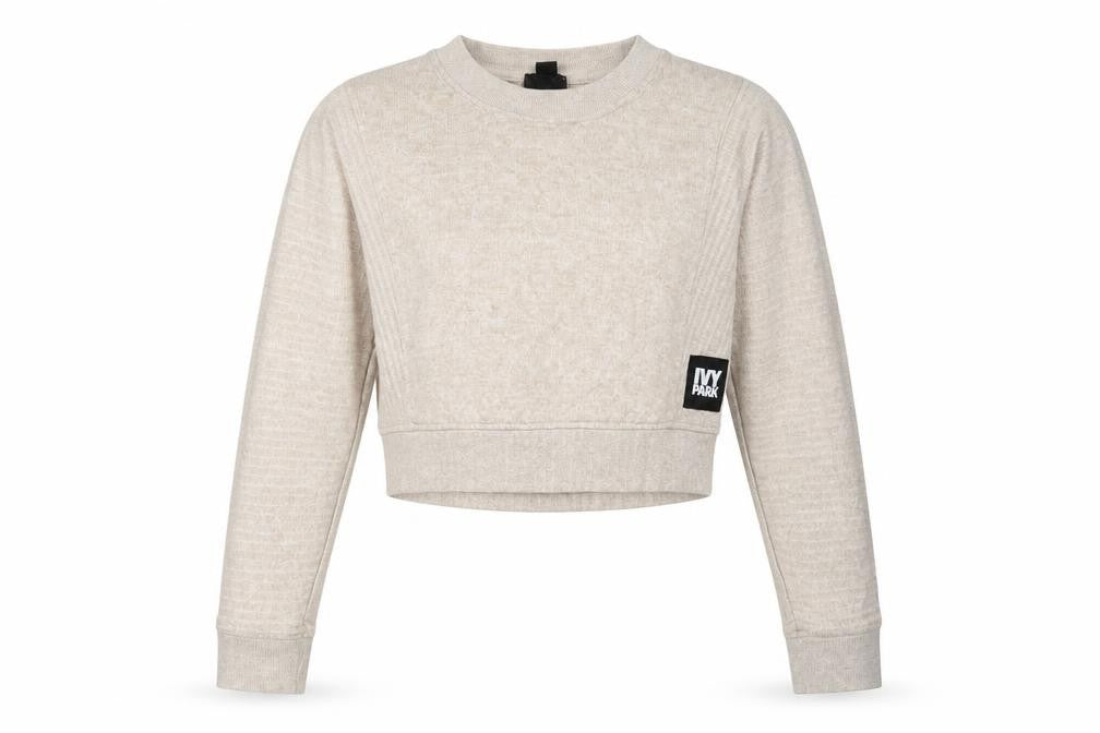 Front view of Ivy Park women’s beige cropped pullover sweatshirt, size S