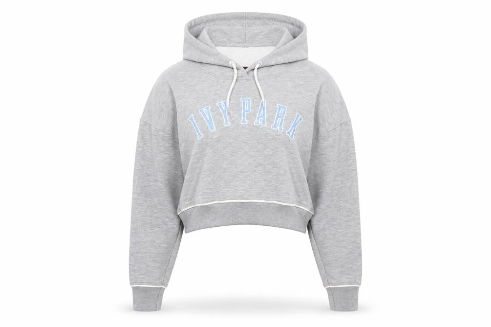 Front view of Ivy Park Women's Grey Cropped Hoodie, size M, Drawstring Pullover