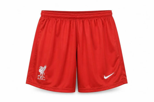 Front view of Nike boys’ red athletic football shorts, size 164, breathable activewear