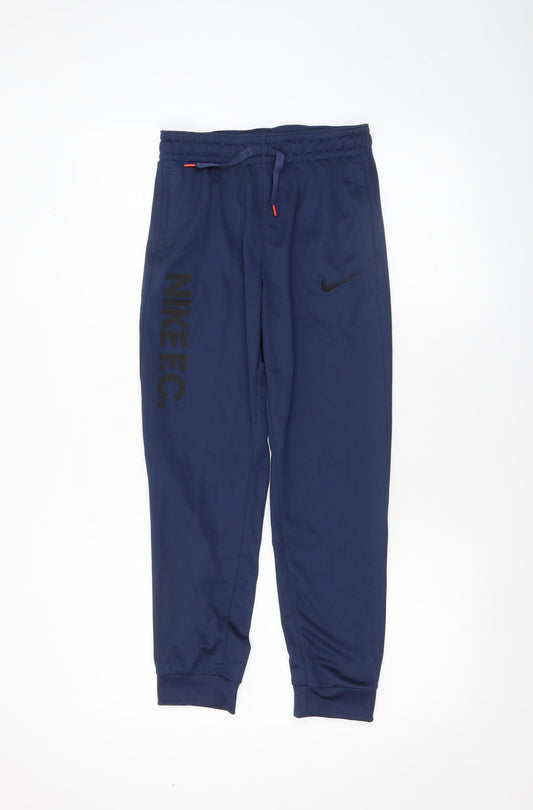 Front view of Nike boys’ blue dri-fit jogger trousers 13-14 years football pants