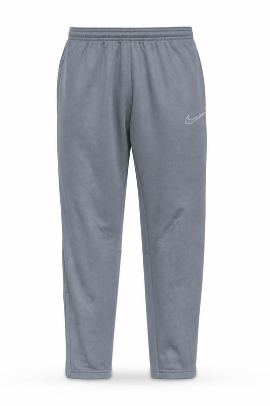 Front view of Nike boys’ grey dri-fit jogger trousers m 137-147cm active stretch pants