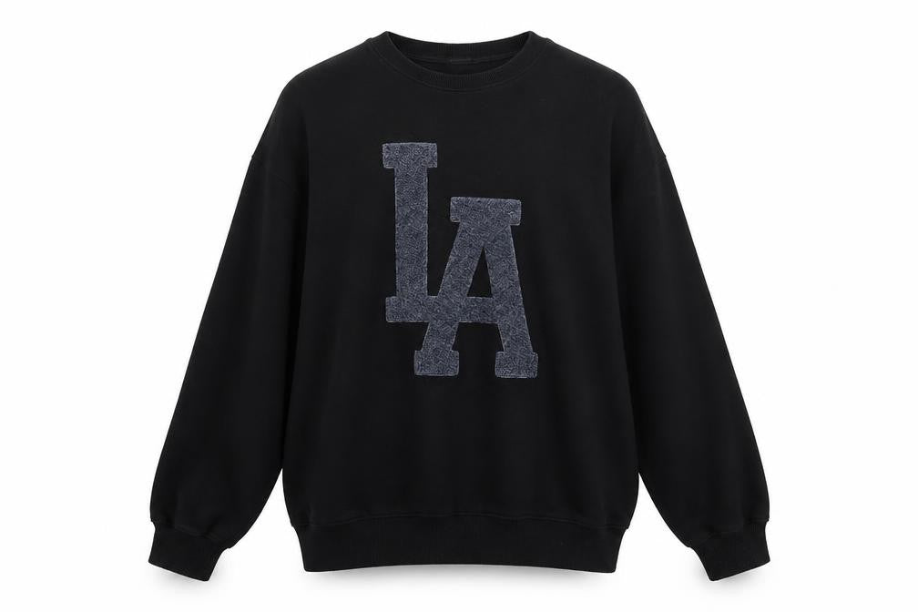 Front view of H&M women’s black la pullover sweatshirt medium relaxed fit